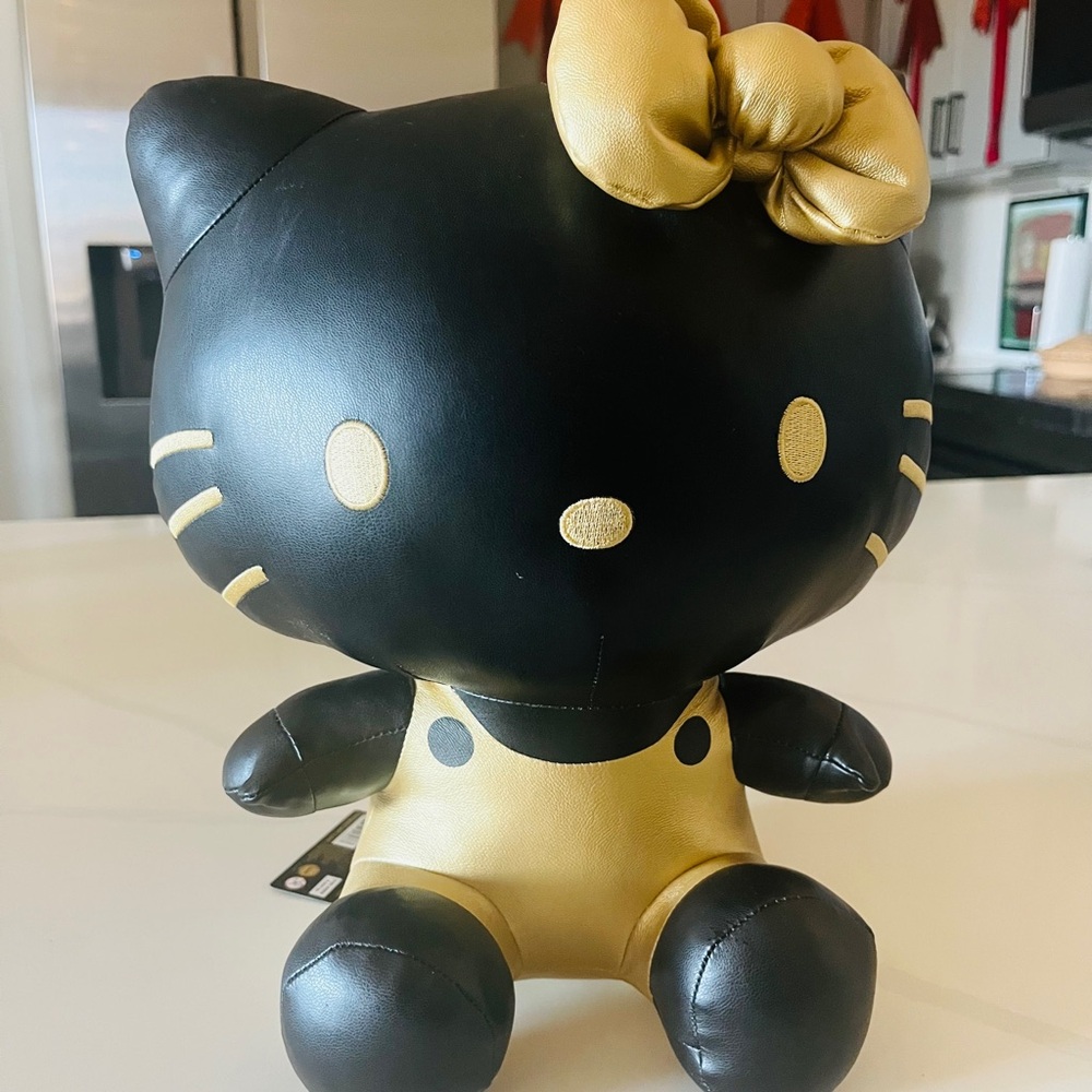 Black and Gold Plush Cat Figurine